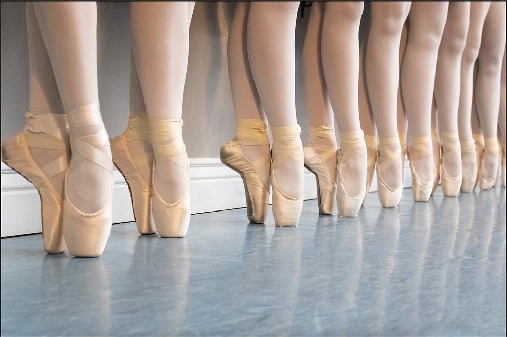Ballet dancer practicing on stage.